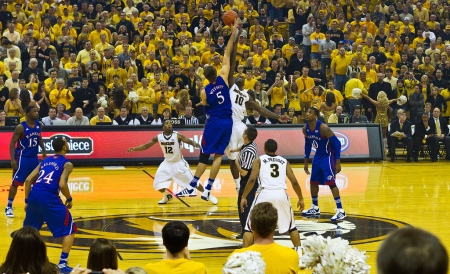 Kansas center Jeff Withey jumps for the ball against Missouri forward Ricardo Ratliffe at the beginning of the game between the #8 Jayhawks and #4 Tigers at Missouri's Mizzou Arena in Colombia, Mo., on Feb. 4, 2012. Missouri beat Kansas 74-71. Photo courtesy of Taylor Bennett on Flickr.